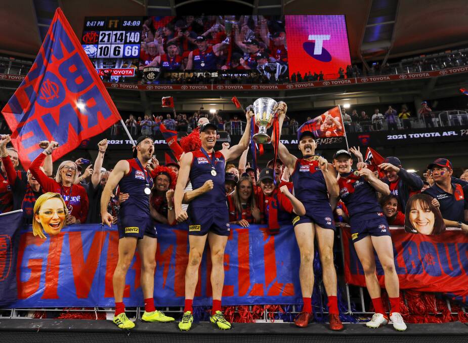 PREMIERS: Greater Western Victoria Rebels product Tom McDonald, second from left, celebrates Melbourne's premiership win. Picture: Dylan Burns/AFL Photos/Getty Images