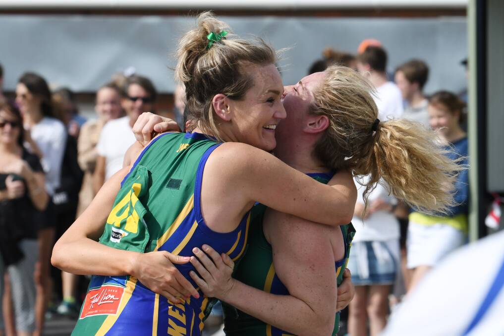 New Lake Wendouree coach Courtney McLean, right, celebrates the Lakers' 2017 B Grade premiership. Picture: Kate Healy