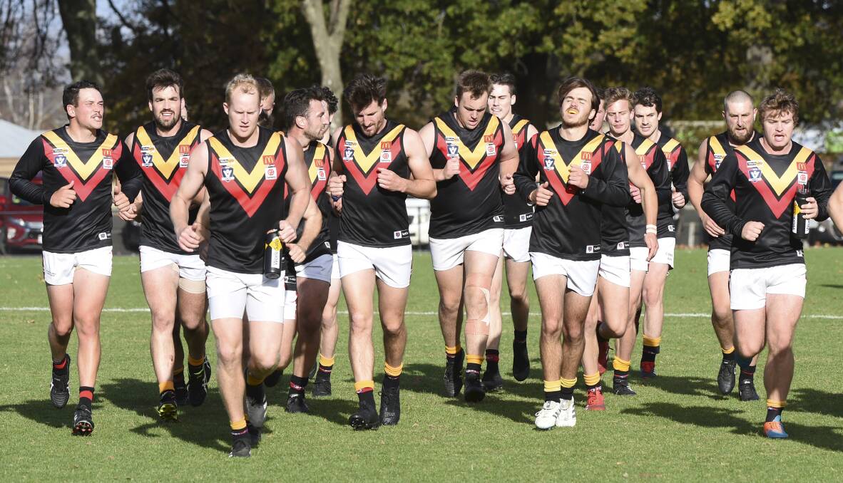 UNITED: Bacchus Marsh leaves the field during the 2021 BFNL season. Picture: Lachlan Bence