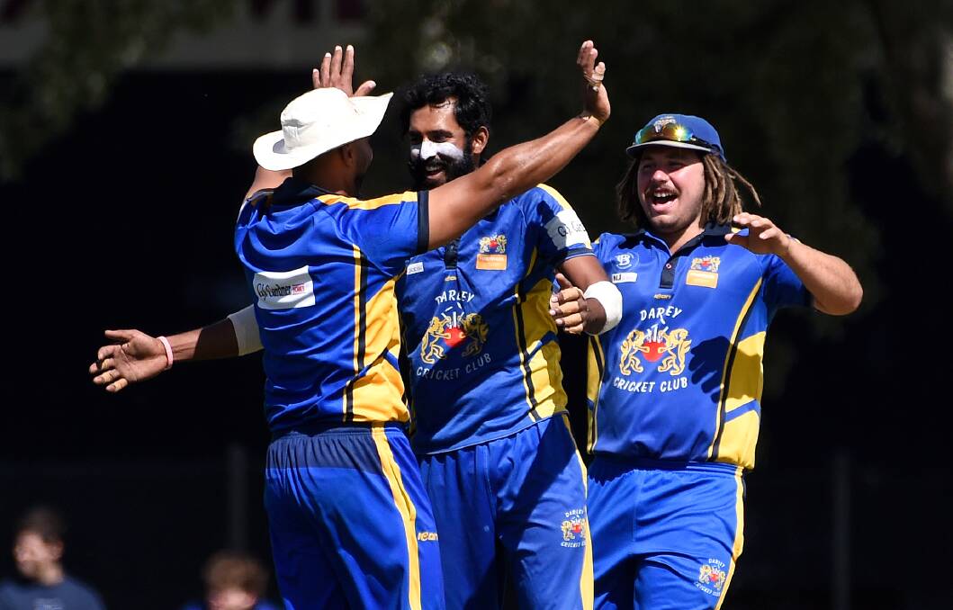 GOOD MEMORIES: Darley's Hasitha Wickramasinghe (middle) celebrates a wicket with teammates Rahmatullah Khwaja (left) and Drew Locke. Picture: Adam Trafford
