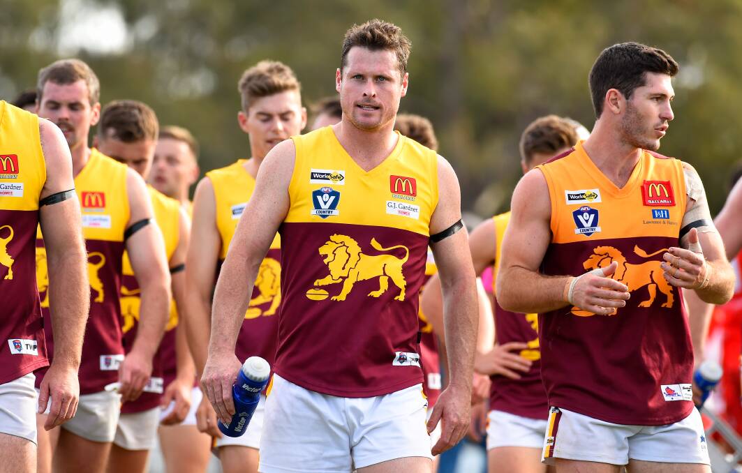 Lachlan George leads Redan from the field during the 2019 season. Picture: Adam Trafford