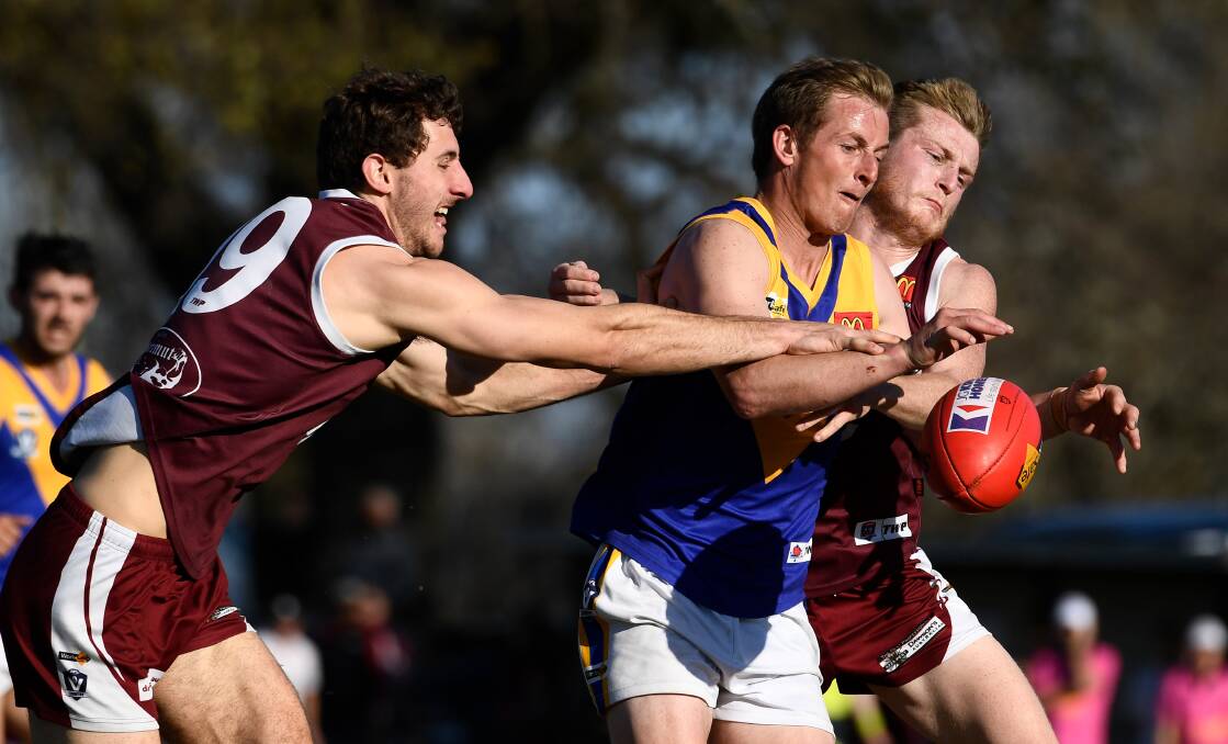 Jacob Wilkinson of Sebastopol competes for the ball against Melton. Picture: Adam Trafford