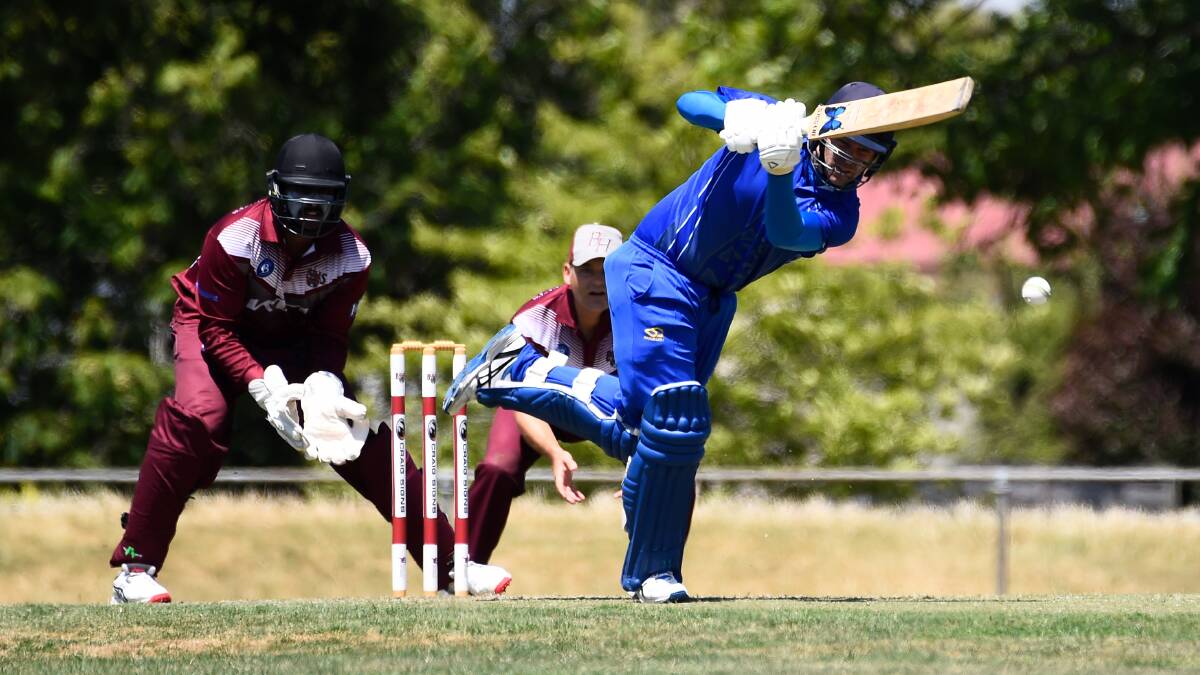 Golden Point's Josh White drives down the ground during the Ballarat Cricket Association clash with Brown Hill. Picture by Adam Trafford. 