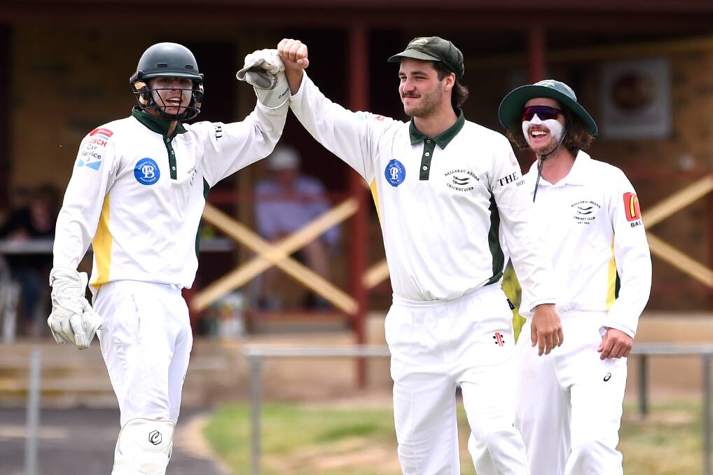 Ballarat-Redan players celebrate a wicket COVID-style last summer. Picture: Adam Trafford