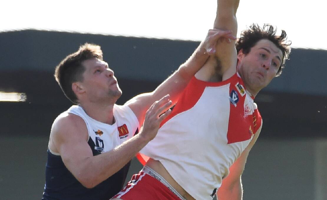 Dylan Jones flies in the ruck for Melton South against Ballarat. Picture: Lachlan Bence