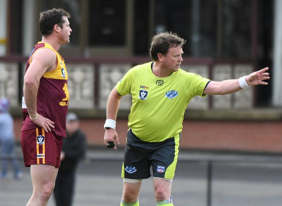 CHANGES: Umpires have had to brush up on the new "stand the mark" rule. Picture: Lachlan Bence