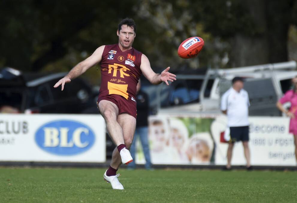 Lachie George moves the ball forward for Redan. Picture: Lachlan Bence