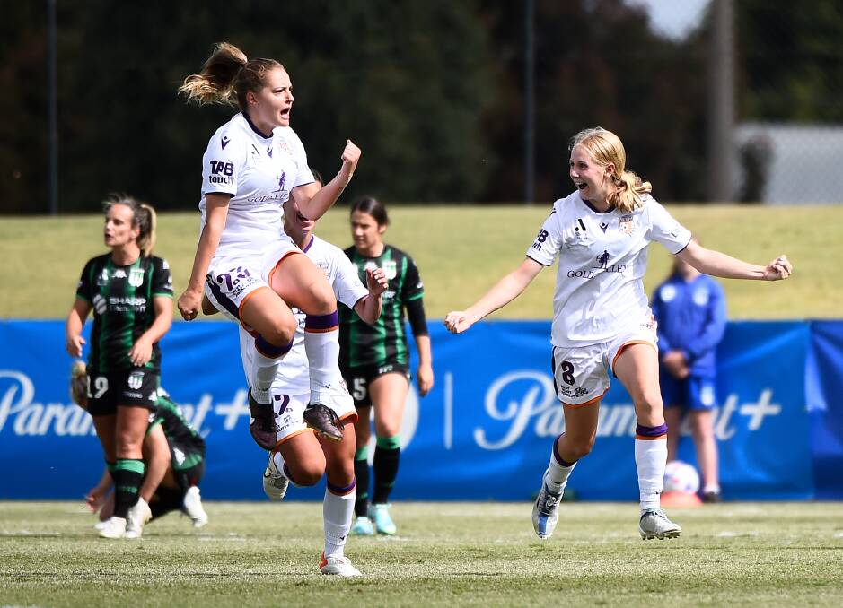 Hannah Blake, left, celebrates a goal in the Perth Glory's 3-1 win. Picture by Adam Trafford.