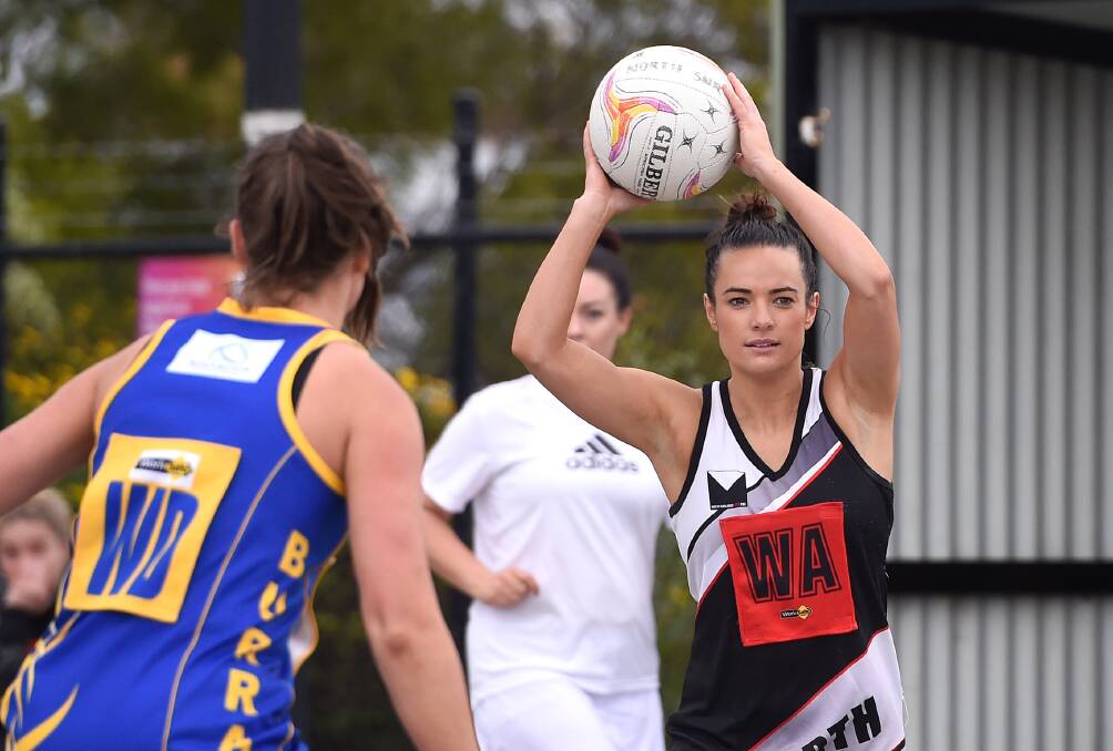 OPTIONS: North Ballarat's Gina McCartin looks to move the ball on. Picture: Adam Trafford