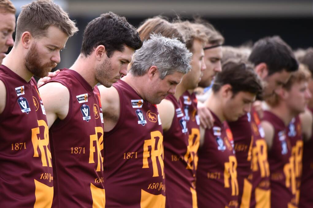 Redan lines up for the national anthem before its round two clash. Picture: Adam Trafford