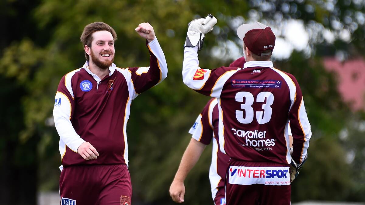 Brown Hill's Jason Knowles celebrates a wicket with James Waller. Picture: Adam Trafford