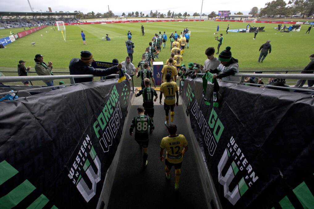 Western United walks out on to Mars Stadium for a match during the 2021-22 A-League Men's season. Picture by Luke Hemer.
