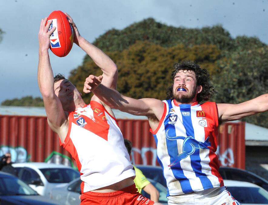Ballarat's Daniel Kennedy and East Point's Jacob Brown in action during round seven. Picture: Lachlan Bence