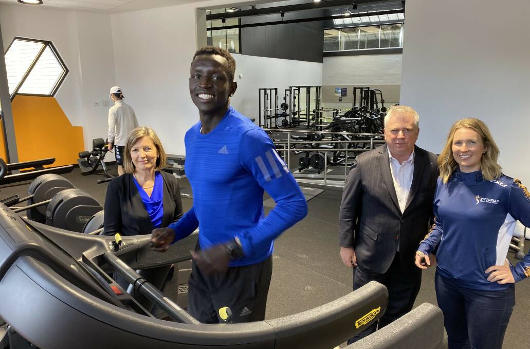 Fed Uni vice chancellor Professor Helen Bartlett, Australian 800m runner Peter Bol, World Academy of Sport managing director Chris Solly and Olympic and Paralympic table tennis player Milly Tapper inside the university's most recent infrastructure project, the sports science centre.