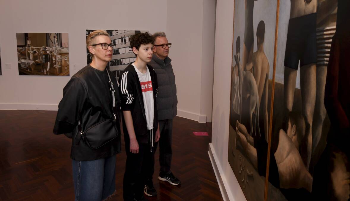 VISITING: Maryann, Elliot and Tim Hulbert were among the first visitors back in to the Art Gallery of Ballarat following its reopening on Wednesday. Picture: Lachlan Bence