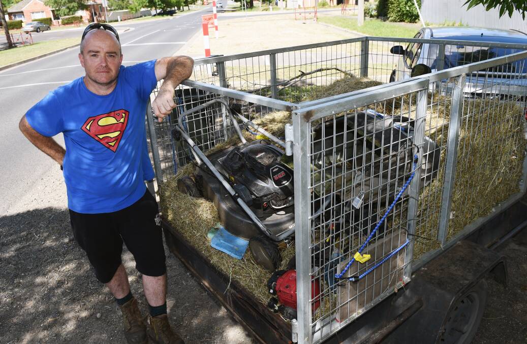 MOWED: Robert Edwards cleared thigh-high grass near the St Aloysius Parish School crossing in Redan because he feared children could encounter snakes. Picture: Kate Healy