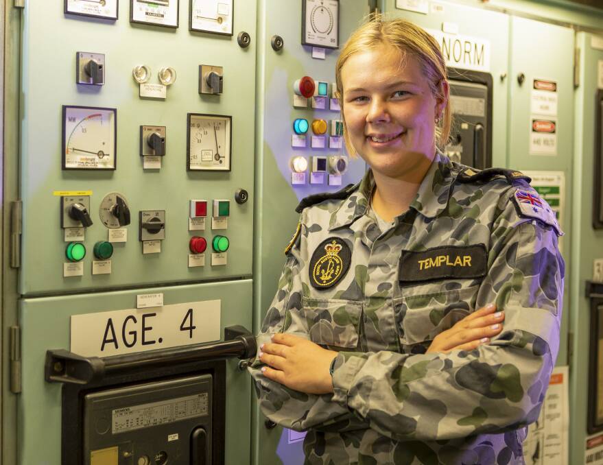 ABOARD: Midshipman Abiathar Templar in a control room on board the HMAS Ballarat. Pictures: LSIS Ronnie Baltoft/Defence Media