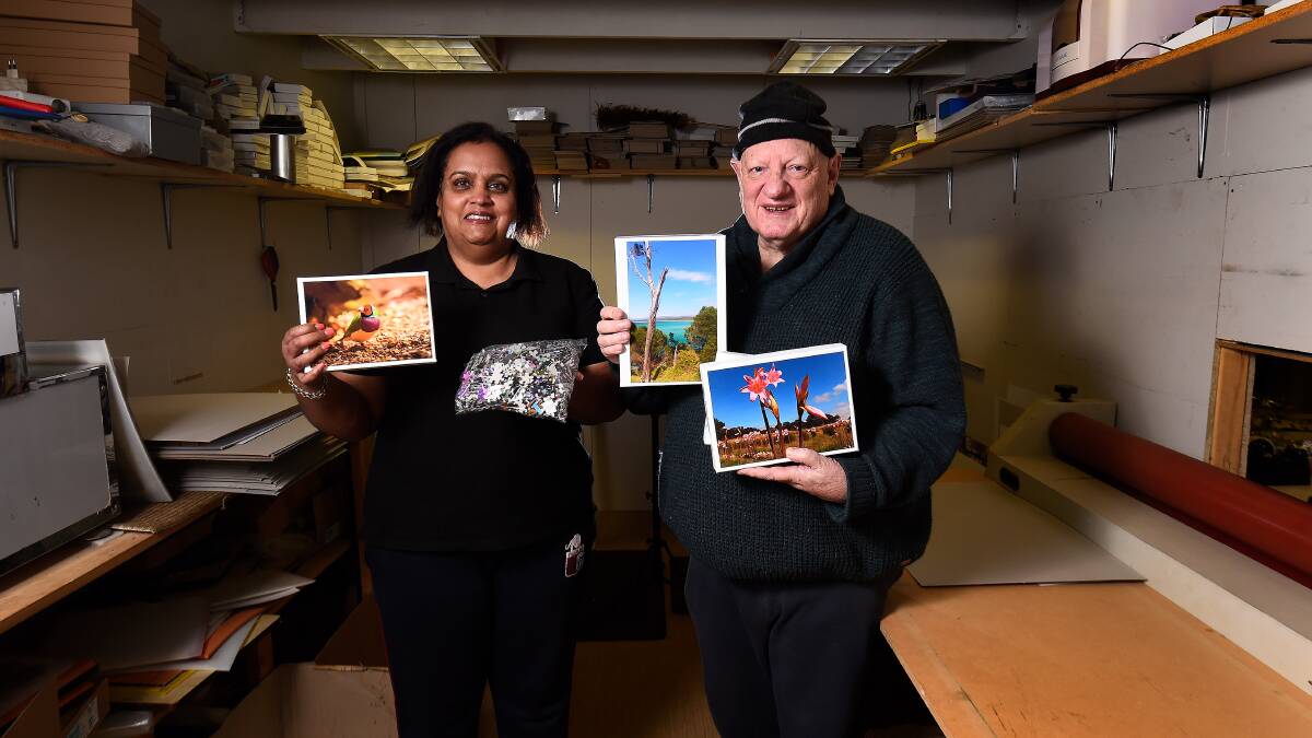 PIECES: Peter and Susan Begbie at their Warrenheip business Jigsaw Puzzles Australia with some of the puzzles ordered by individual and corporate clients to put together during lockdown. Picture: Adam Trafford