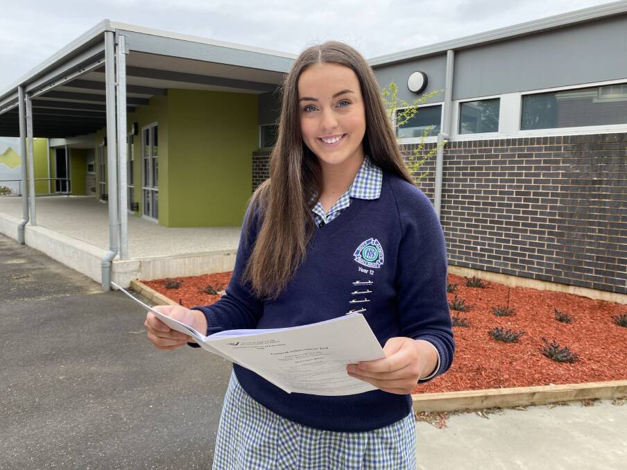 DONE: Ballarat High School vice captain Sophie Kurzman reviews the GAT paper outside the school's year 12 centre after finishing the three and a quarter hour exam on Wednesday. Picture: Michelle Smith
