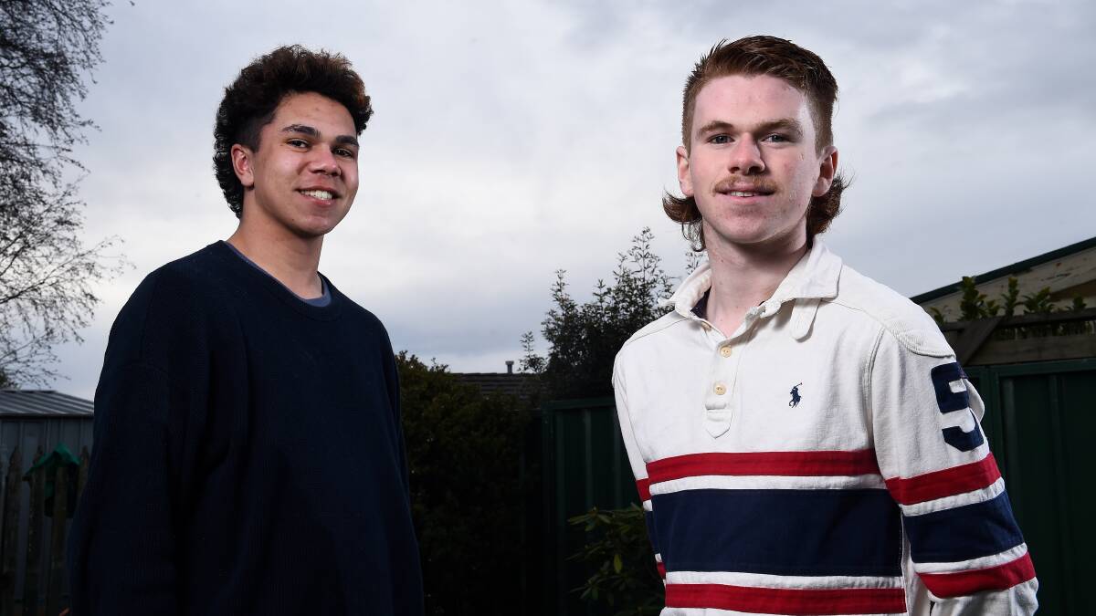 HAIR: Jack Sampi and Darcy Cosgriff model their new mullets to help raise funds for mental health. Picture: Adam Trafford