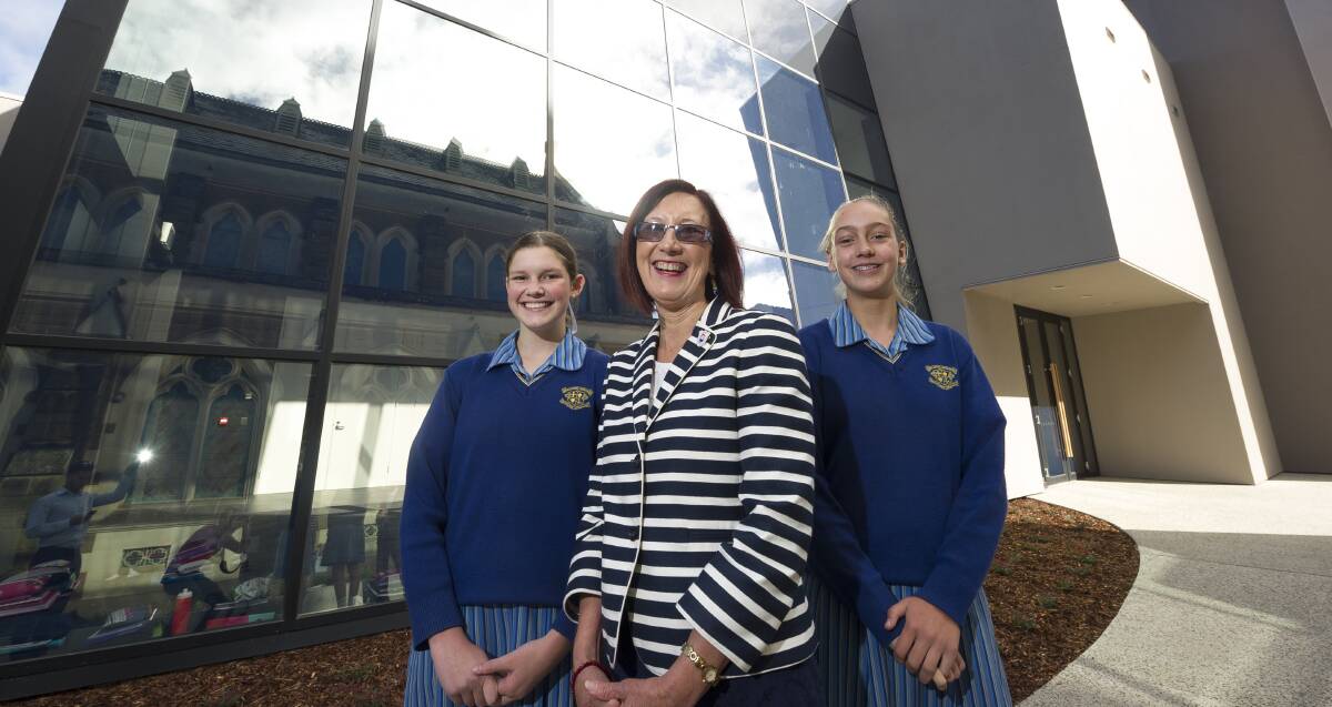 Loreto College principal Judith Potter with year eight students Georgia Doyle and Hazel Lanyon at the 2015 opening of the school's new performing arts centre. 