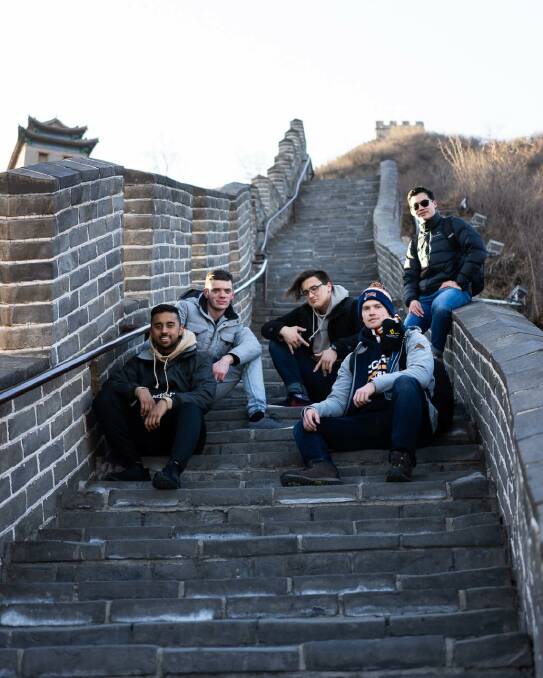 GREAT WALL: Kyle Jackson (second from left) with other participants in the Huawei Seeds for the Future program visit the Great Wall of China. Picture: supplied