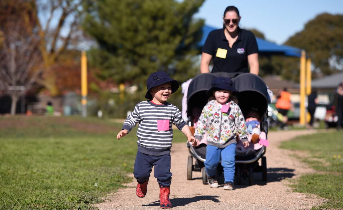 JOY: Children, teachers and families took part in the first Little Wonders Mothers Day Walkathon at St James Parish Primary School. Picture: Adam Trafford