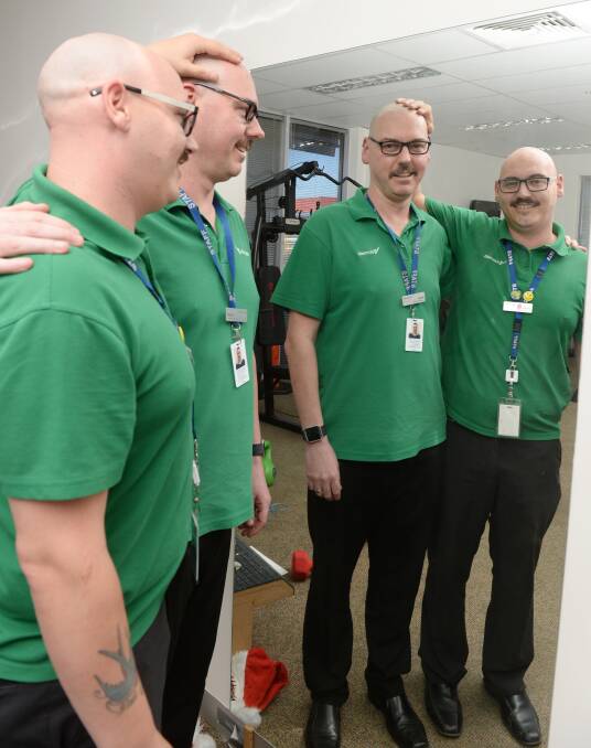 TWINS: Lookalikes Wade McGregor and Wade Farrugia after a joke about shaved heads led to Mr McGregor losing his locks to raise money for breast cancer. Picture: Kate Healy