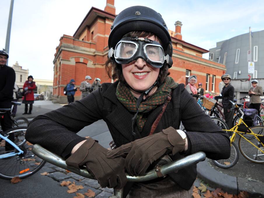 Libby Drew saddles up for last year's Heritage Weekend Federation Uni Tweed Ride. Picture: Lachlan Bence
