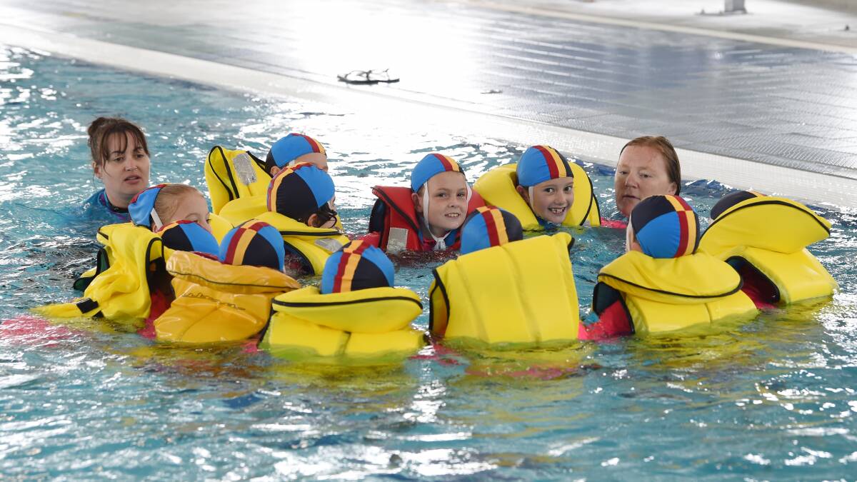 FLOAT: Pleasant Street Primary pupils test the buoyancy of life jackets during a bush nippers exercise at Ballarat Aquatic and Lifestyle Centre. Picture: Kate Healy