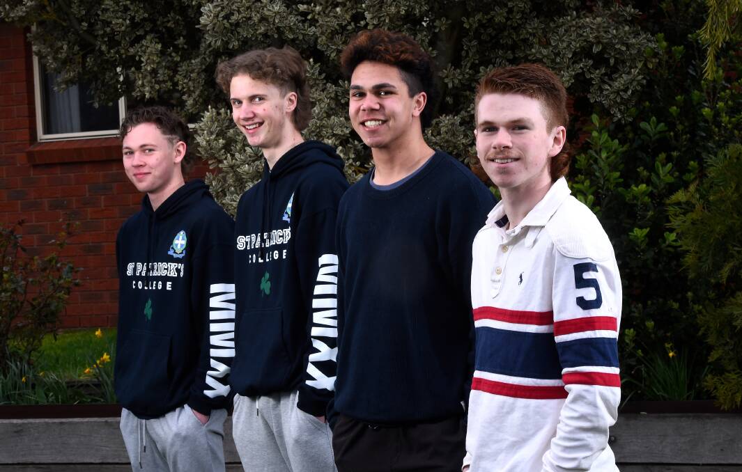 MULLET MEN: Bailey Colligan, Lachlan Hubble, Jack Sampi and Darcy Cosgriff show off the mullets they will wear throughout September to raise funds for the Black Dog Institute and mental health research. Picture: Adam Trafford