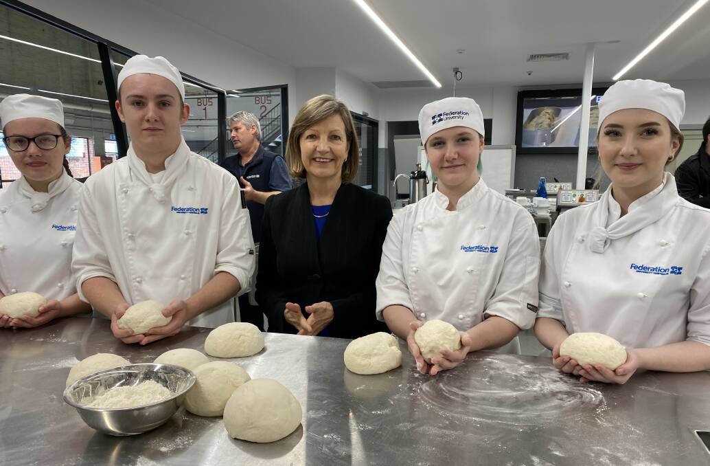 BAKE OFF: Apprentices Hayley, Lucas, Tylah and Portia with Federation University vice chancellor Professor Helen Bartlett in the new Baking Training Centre. Picture: Michelle Smith