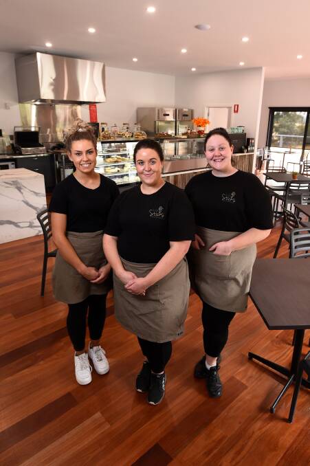 OPEN: Holly Walker, cafe manager Alissa Cooke and Sharna Cooke in Avalon Nursery's new cafe In the Sticks. Picture: Adam Trafford
