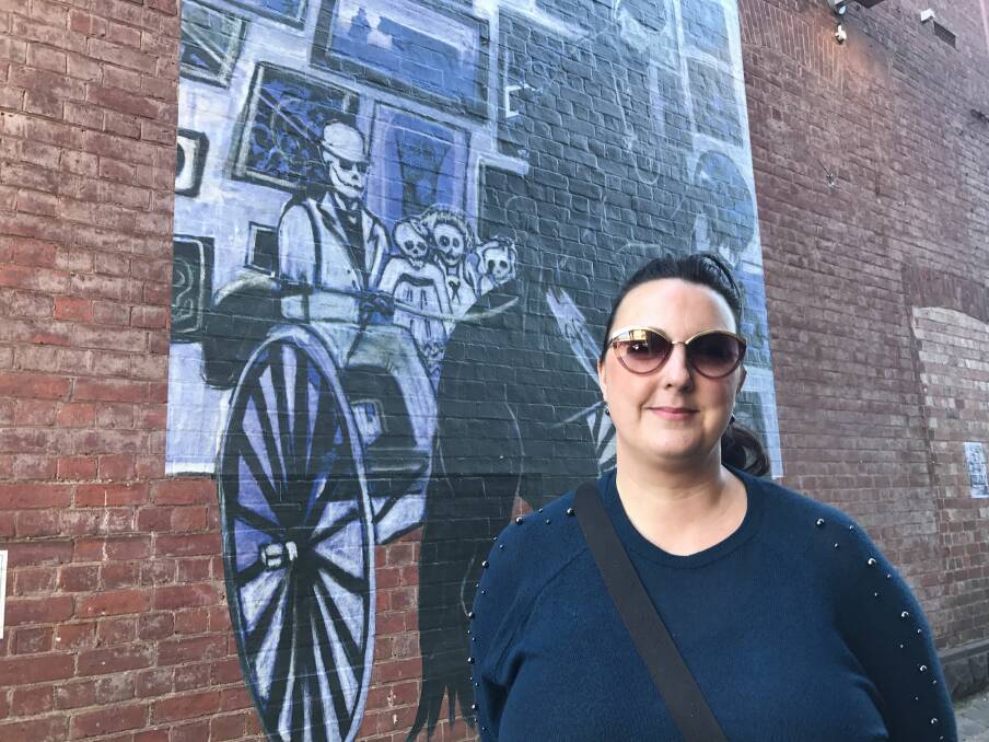 ARTWALK: Artist Samantha Thompson with her mural Seize the Day in Police Lane, which is part of Ballarat Winter Festival's Activated ArtWalk series.