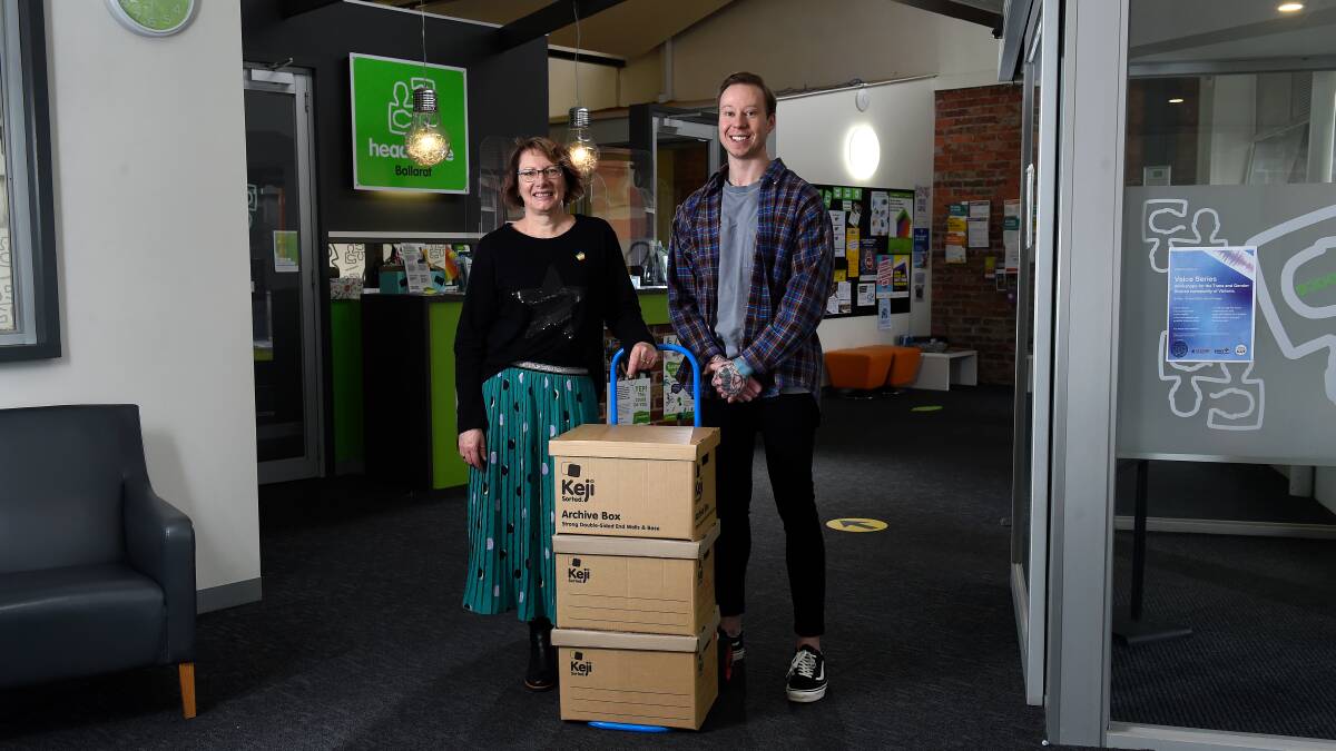 MOVING: headspace centre manager Janelle Johnson and community engagement officer Andy Penny packing up the Camp Street centre ahead of renovations. Picture: Adam Trafford