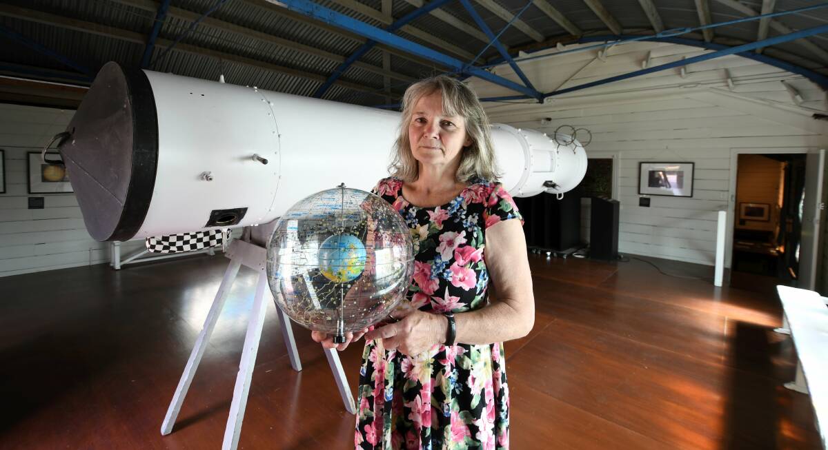 ANNIVERSARY: Judith Bailey with the Baker telescope which is celebrating 130 years.