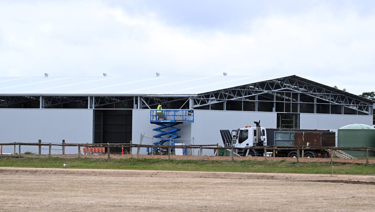 Construction crews working on the new South Pavilion at the Mount Rowan showgrounds. Picture by Kate Healy