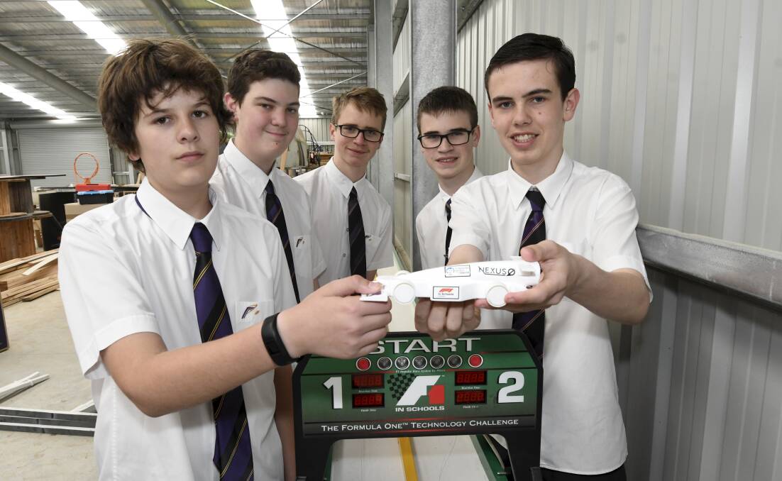 Brad Vinall, Hayden Gregg, William Kynoch, Lachlan Kynoch, and Aston Brownbill took out second place in the professional senior class of the F1 in Schools competition. Picture by Lachlan Bence