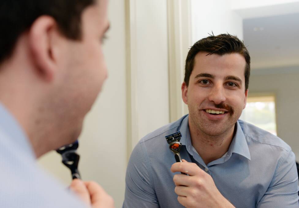 HALF MO: James Westbrook is happy to look lop-sided to raise awareness of men's health and will sport half a moustache for the final day of Movember. Picture: Kate Healy