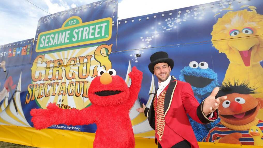 ON STAGE: Elmo and the ringmaster of the Sesame Street Circus Spectacular. Picture: supplied