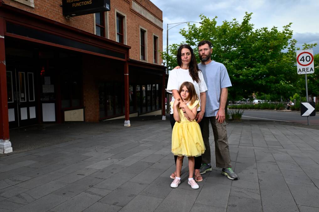 Alex Catsicakis, Sean Murray and their daughter Victoria, 6, lost their home in a Christmas morning blaze at Learmonth and now an insurance bungle on their home means the future of their new Ballarat restaurant is also uncertain. Picture by Adam Trafford 