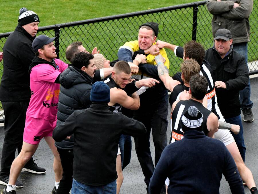 BRAWL: Fists fly during an off-ground altercation at half time in the BFL preliminary final between East Point and Darley at City Oval. Picture: Lachlan Bence