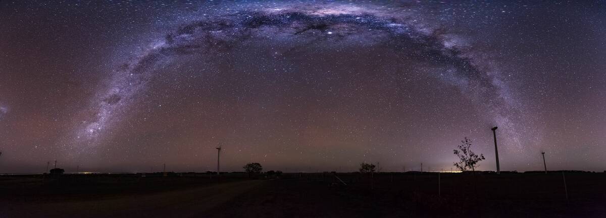 NIGHT RAINBOW: A panorama of the Milky Way taken from Mount Mercer Wind Farm. Photographer: Randal Smith