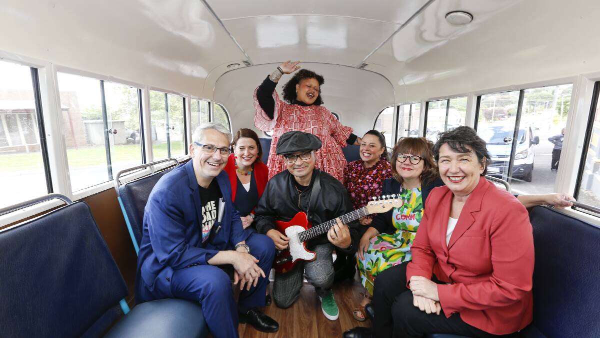 ROAD TRIP: Minister for Creative Industries Danny Pearson, member for Wendouree Juliana Addison, performers Kaiit and Mikey Chan, host Myf Warhurst, Kate Duncan from The Push and member for Buninyong Michaela Settle on the restored bus at the launch of On the Road Again. Picture: Luke Hemer.