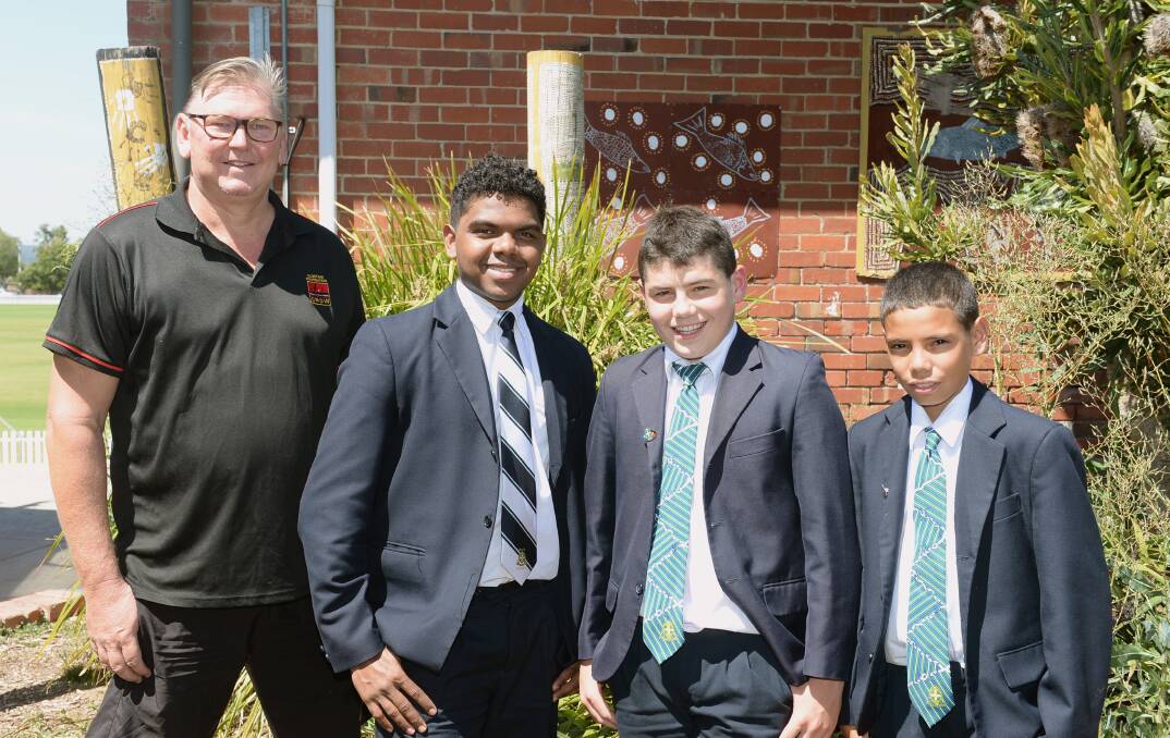 St Pats Clontarf Academy Director Dave Friebel, Cobain Tipiloura (year 12), Laine Scott (year 8) and Marc Tedcastle (year 8). Picture by Kate Healy
