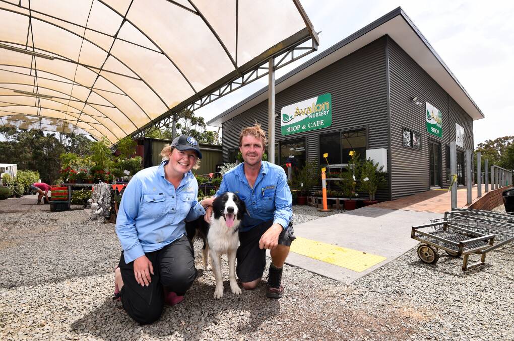 DREAM: Avalon Nursery owners Joanne Williams and David Winters, and their dog Woody, in front of their new In the Sticks cafe and nursery shop. Picture: Adam Trafford