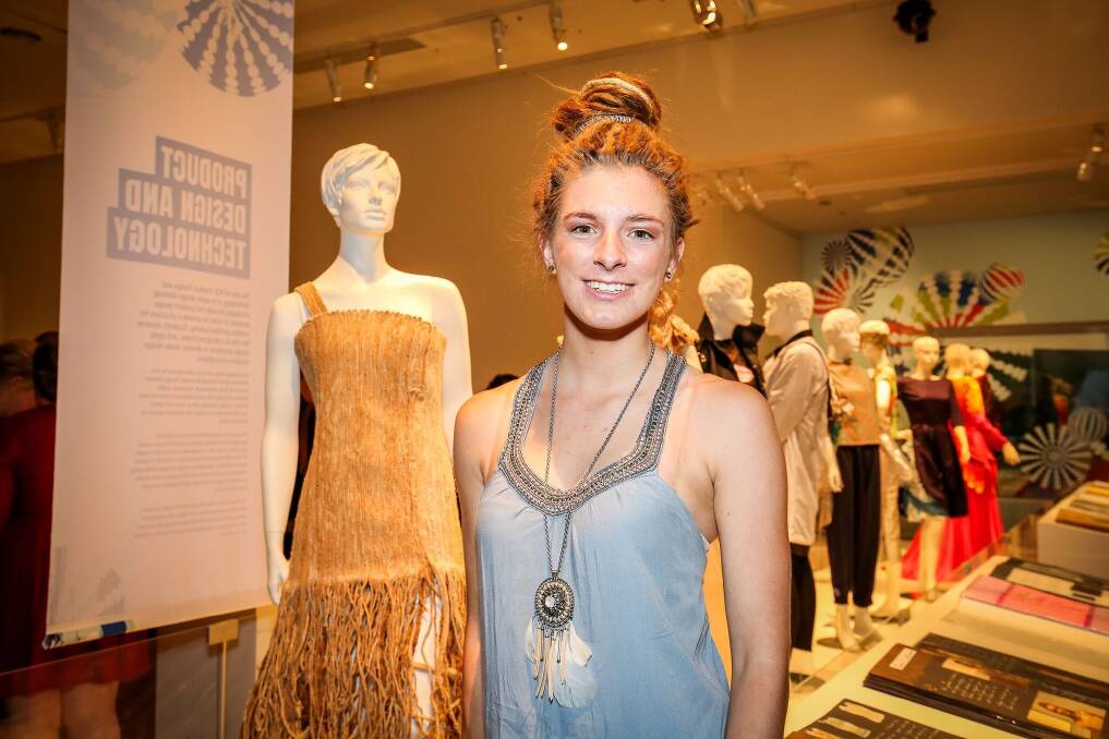 FASHIONABLE: Holly Robertson with her eco-dyed, machine-corded dress on display at Melbourne Museum's Top Designs 2018 VCE exhibition. 