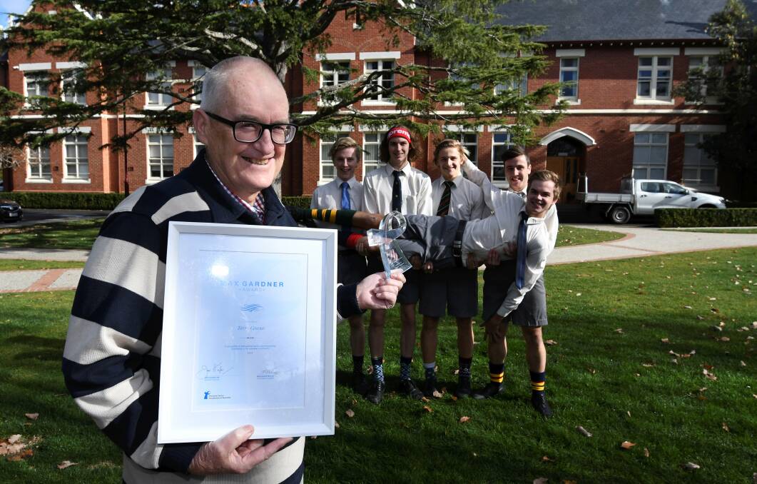 SUPPORT: Terry Grano shares his award with Ballarat Grammar Dart House's Harry, Charles, Daniel, Connor and Andrew. Picture: Lachlan Bence