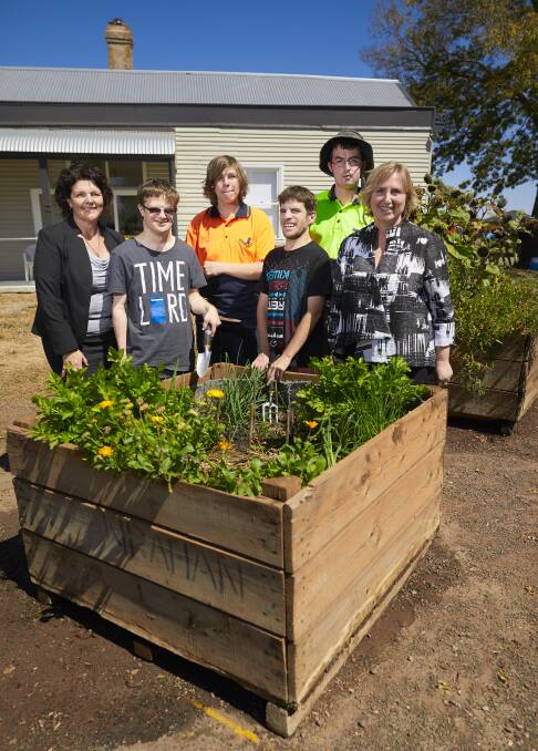 GARDEN TIME: BGT chief executive Mandy Macdonald, Joel Nuridin, Jacques Stone, Rodney Donovan-Clancy, Nick Jacks and Pinarc chief executive Marianne Hubbard at the Pinarc Disability Support gardening and construction program in Bonshaw. Picture: Luka Kauzlaric.