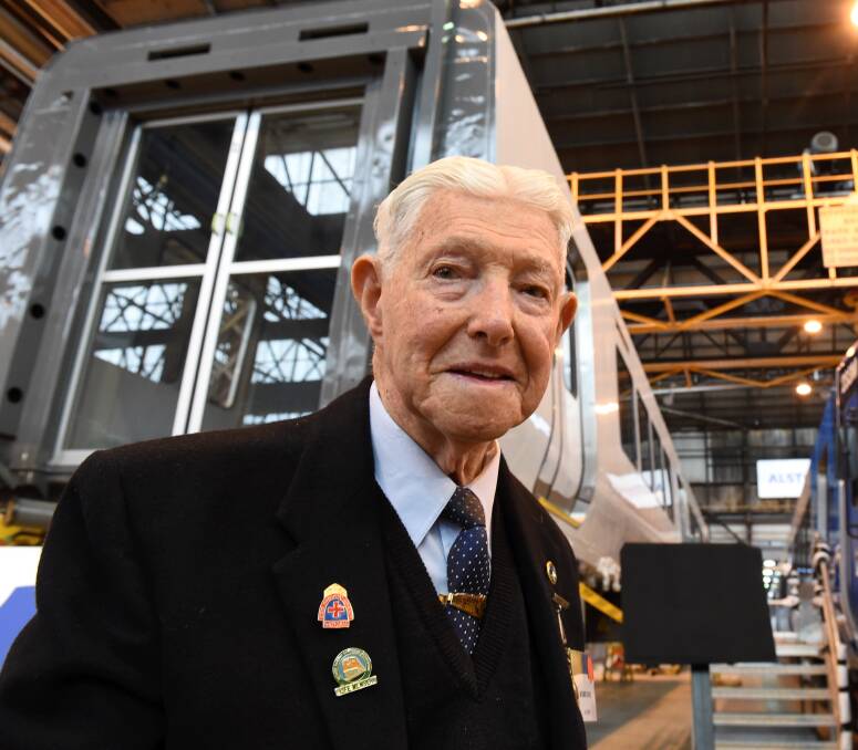 HAPPY RETURNS: Alstom's oldest former employee Richard Davies, 95, worked at the factory for 43 years and returned to celebrate its centenary. Picture: Lachlan Bence